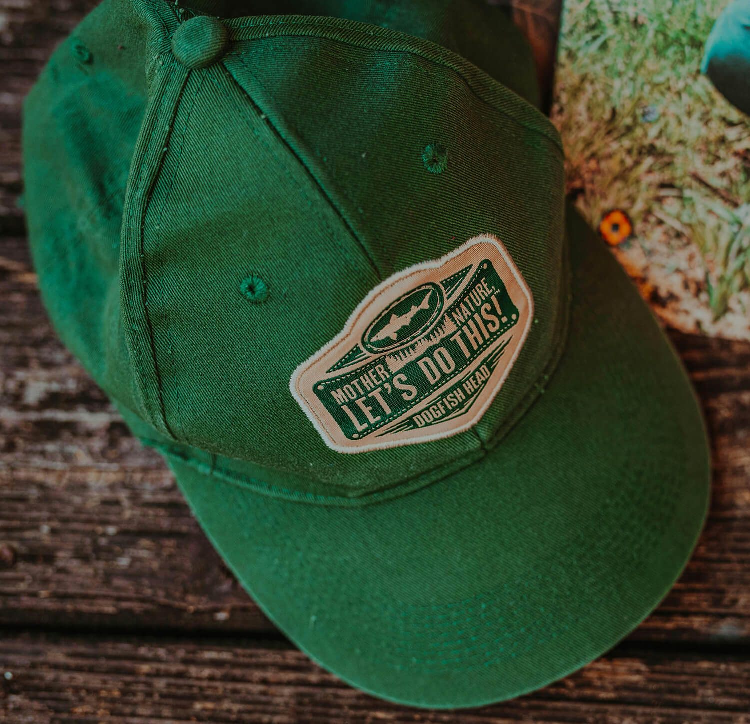 fishing company logo printed on hat for cohesive branding